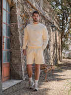 Buttergelber Oversized-Pullover mit Landschaftsmotiv