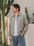Grüne Coach-Jacke