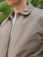 Olivgrüne, wattierte Coach-Jacke mit Reißverschluss