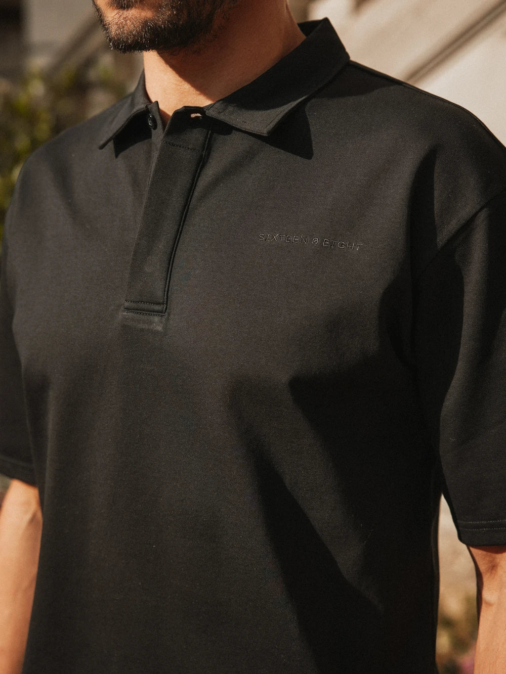 Black Sixteen Relaxed Polo