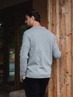 Graue, strukturierte Knopfleiste