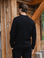 Schwarze, strukturierte Knopfleiste