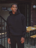 Schwarzer Oversize-Kapuzenpullover