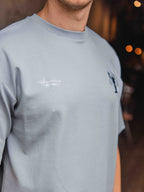 Muster eines übergroßen T-Shirts mit blauem Hummermotiv