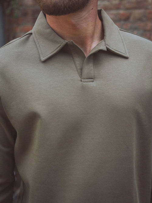 POLO-LONGSLEEVE MIT V-AUSSCHNITT IN GRÜN
