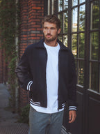 Marineblaue Collegejacke