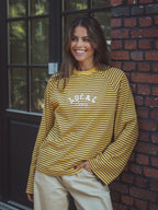 Gelbes Langarmshirt mit Streifen