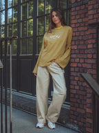 Gelbes Langarmshirt mit Streifen