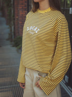 Gelbes Langarmshirt mit Streifen