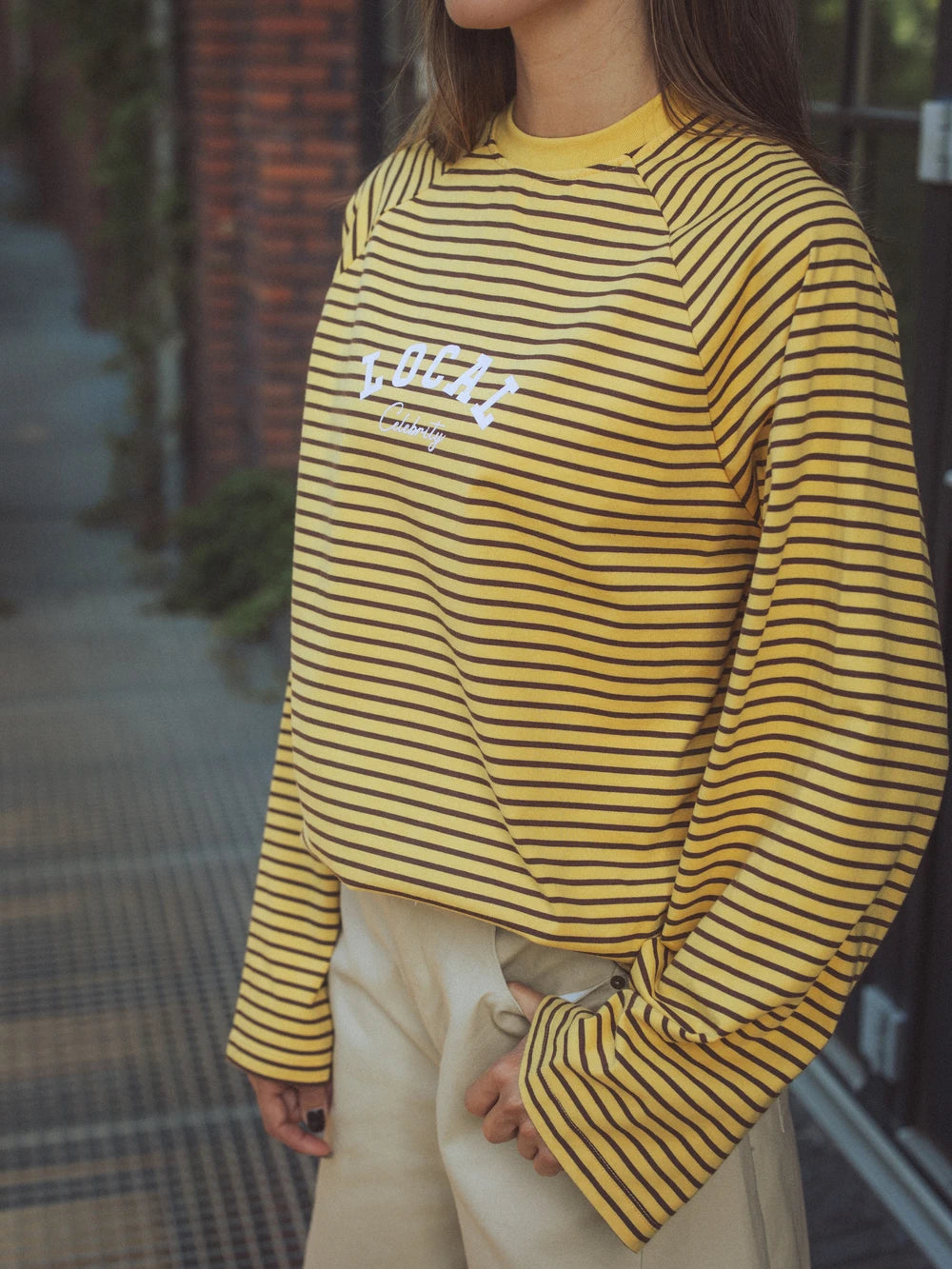 Gelbes Langarmshirt mit Streifen
