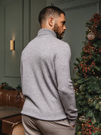 Grauer Wollrollkragenpullover