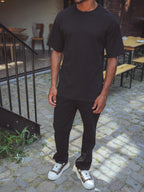 Schwarzes Oversize-T-Shirt