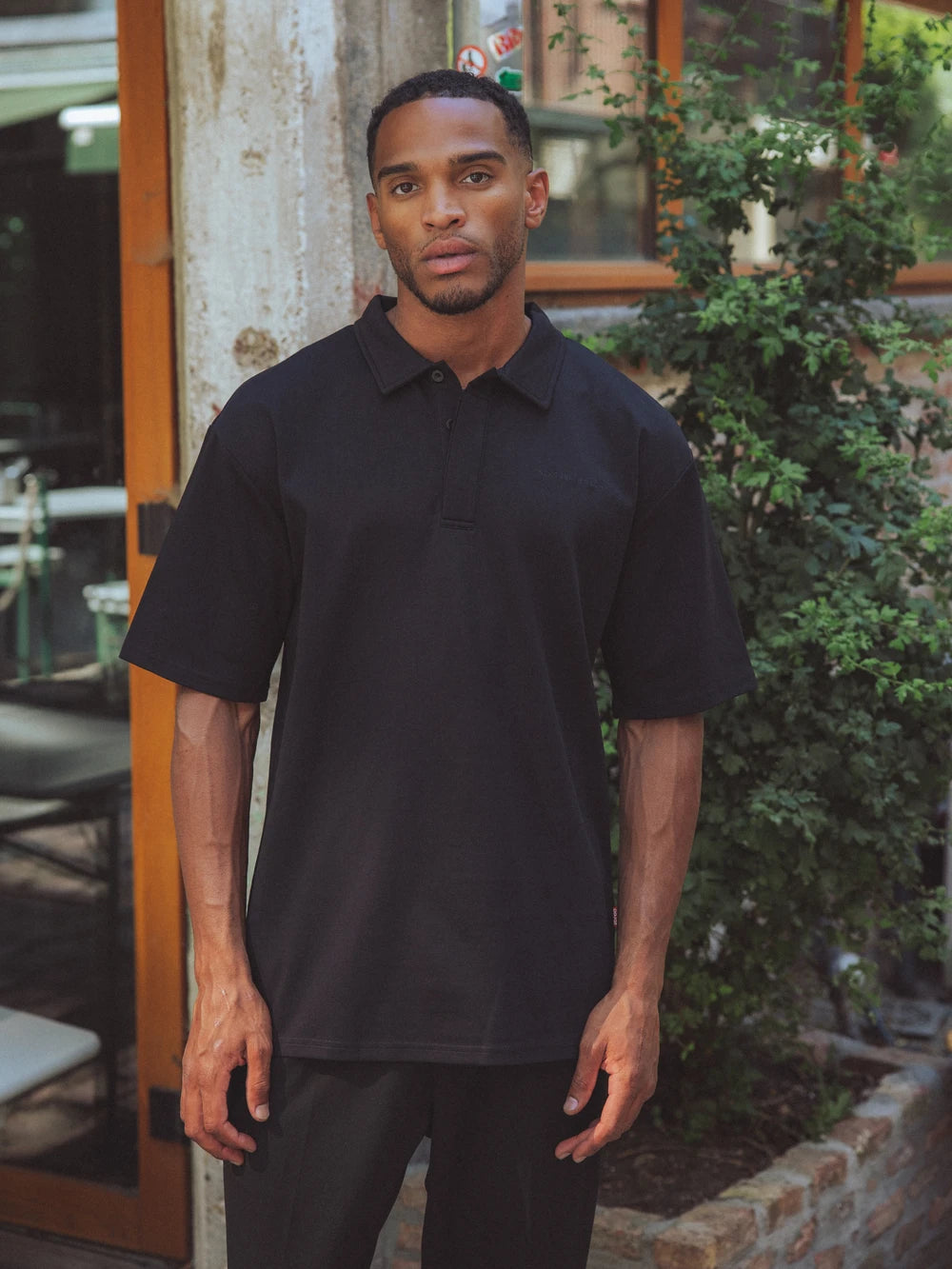 Black Sixteen Relaxed Polo